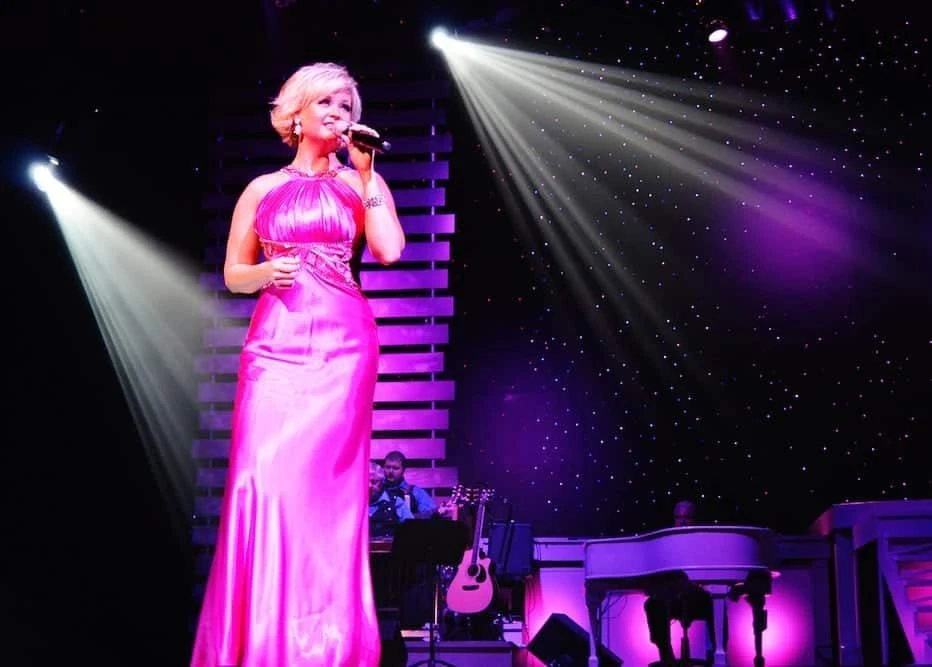 Melinda Hyder singing at the Country Tonite Theater.