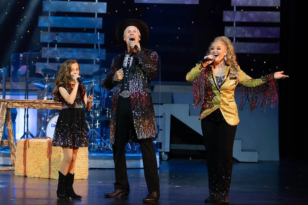 trio of singers at pigeon forge music show