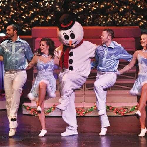 special guests frosty the snowman dacing with the country tonite cast in their pigeon forge christmas show - A Country Christmas Cast special guests frosty the snowman dacing with the country tonite cast in their pigeon forge christmas show - A Country Christmas Cast