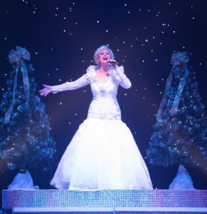 woman singing at christmas show