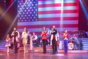 country tonite cast in front of american flag