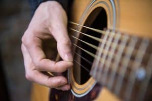 person playing guitar